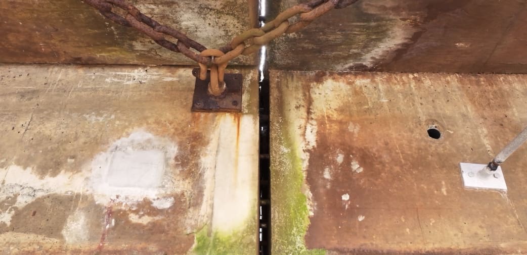 View from underneath showing the underside of the concrete platform and structural details
