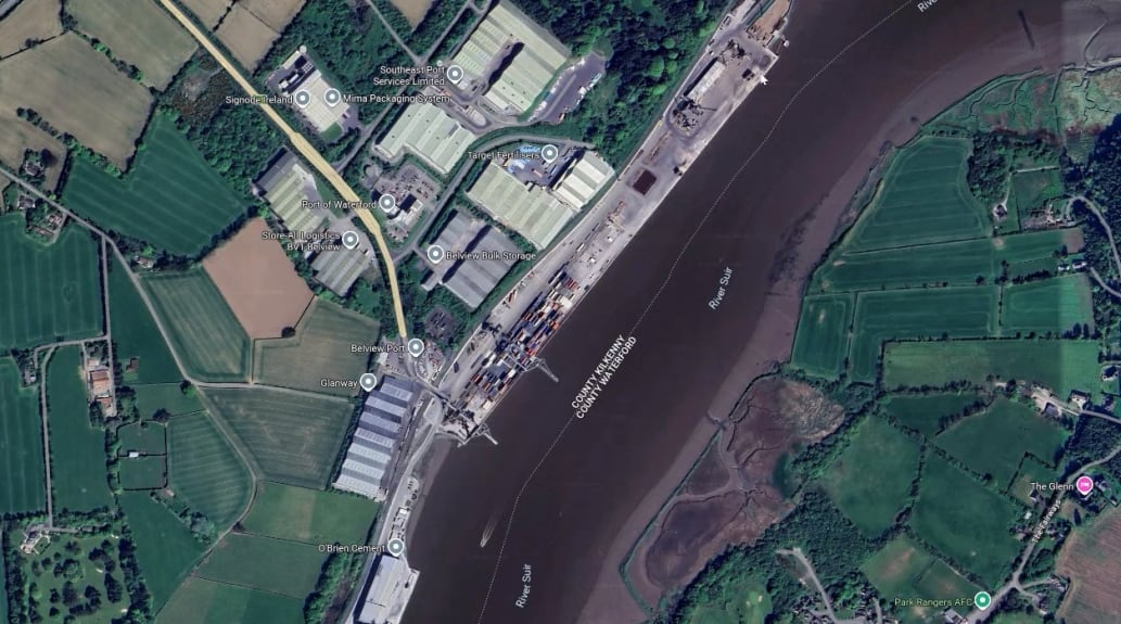 Aerial view of Belview Port showing the pier structure, containers, and ship-shore cranes