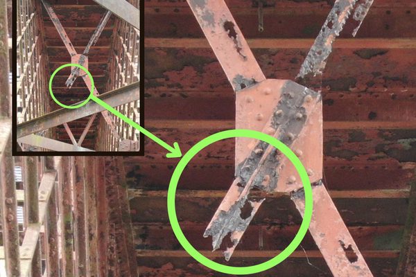 Bridge substructure with defects highlighted on drone inspection imagery