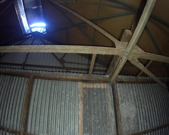 Exterior approach to derelict buildings inspected by confined space drone