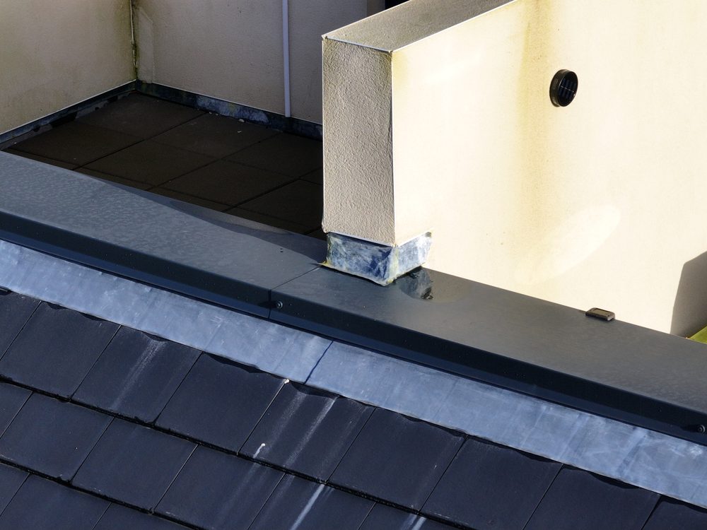 Defective flashing inspection still image taken from the sub-250g C0-class drone showing the roof area.