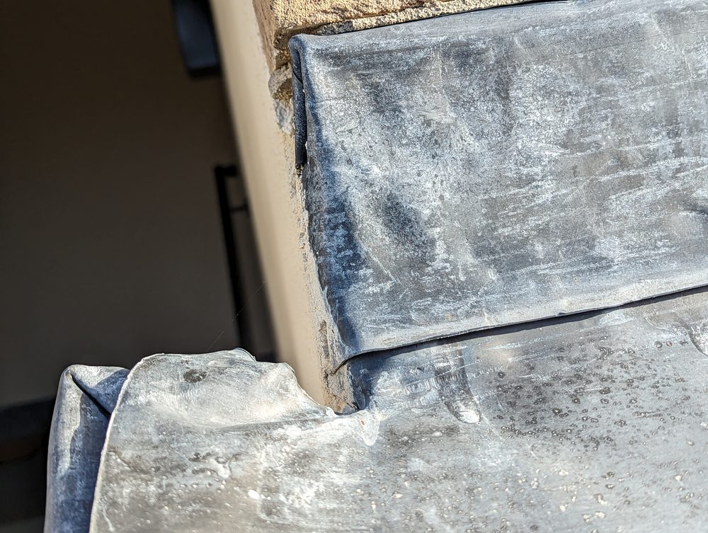A defect image showing only the roof flashing area with no personal data visible