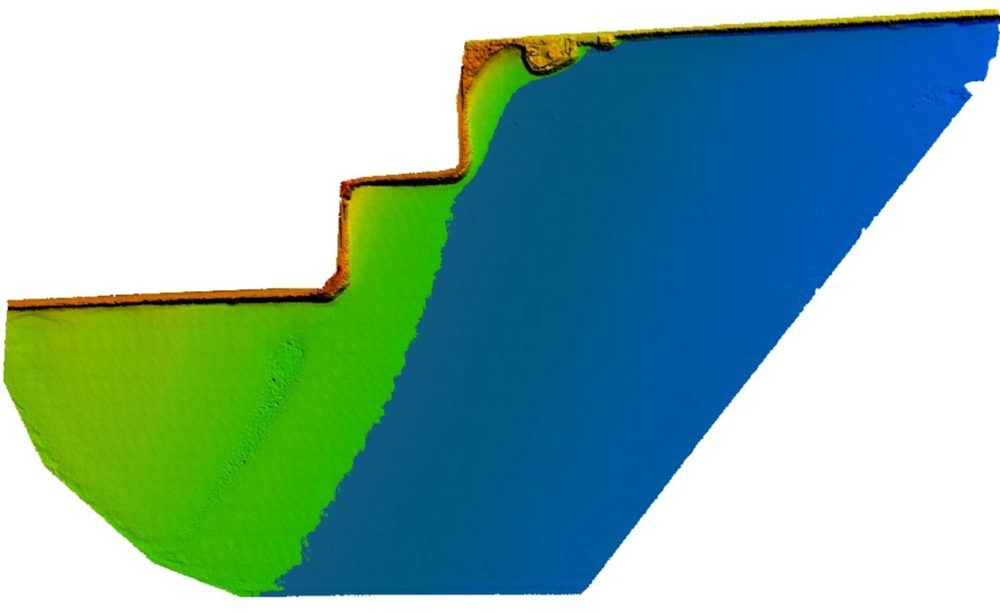 Colourised terrain model of the intertidal zone sloping from the beach down to the water at a landfall site
