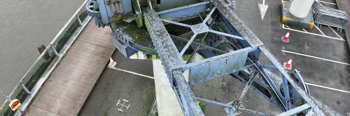 Aerial view of the full lattice framework of the old ship-loading crane on Waterford City docks