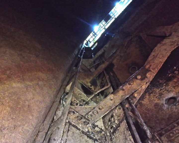 The riveted steel gate structure at the top of the drained penstock at Ardnacrusha Power Station