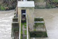High-angle oblique view of the central control cabin and concrete walkway