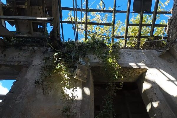 Interior view of a collapsed roof captured by a confined space drone during a storm damage assessment