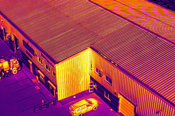 A thermal inspection being carried out on a commercial building