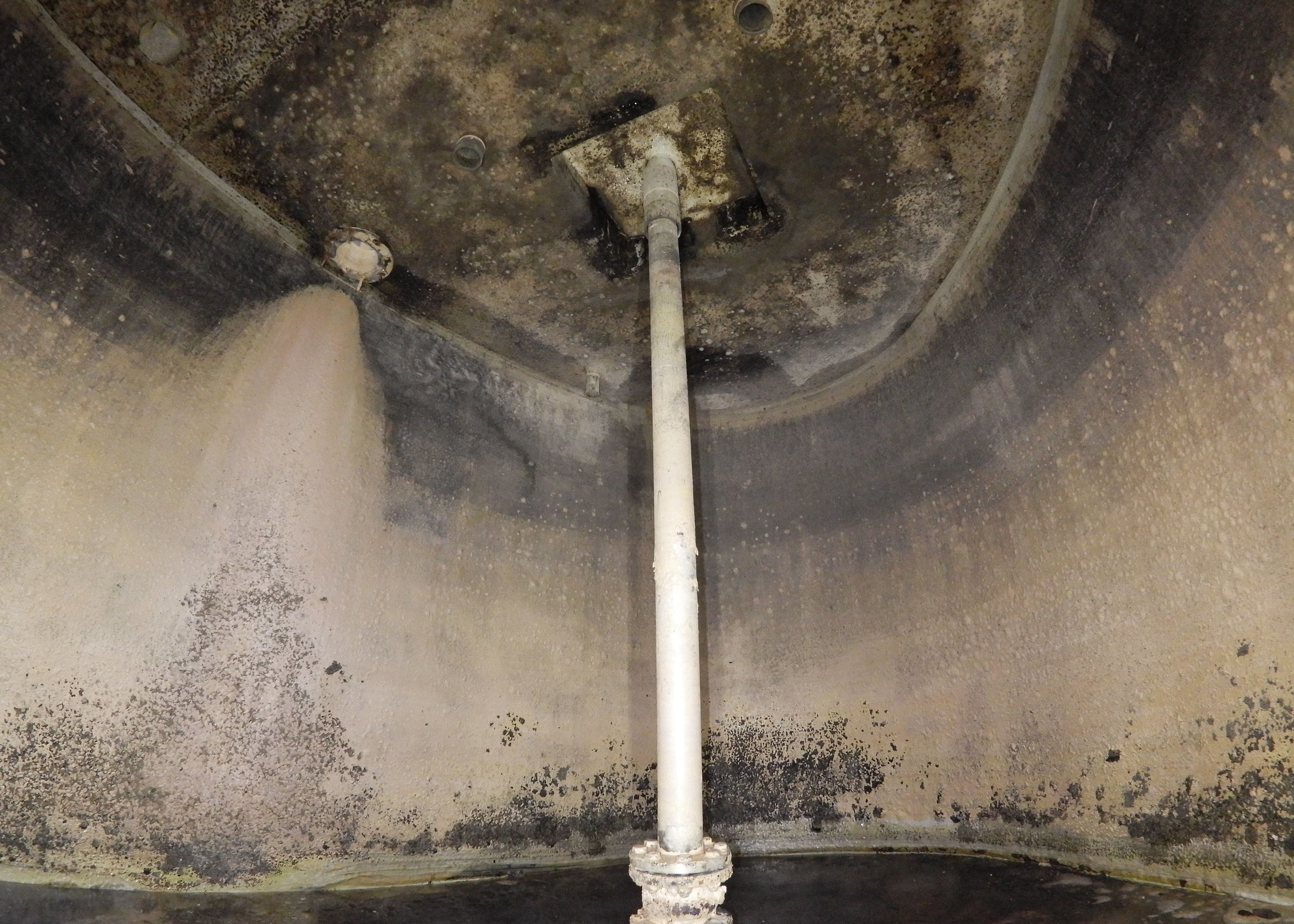 An overview shot of the inside of an underground concrete tank