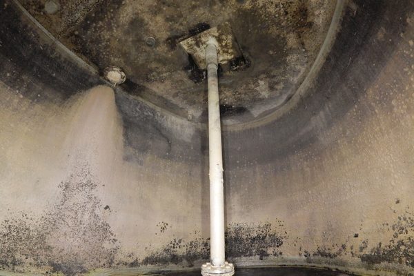 An overview shot of the inside of an underground concrete tank