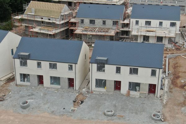 A row of houses under construction