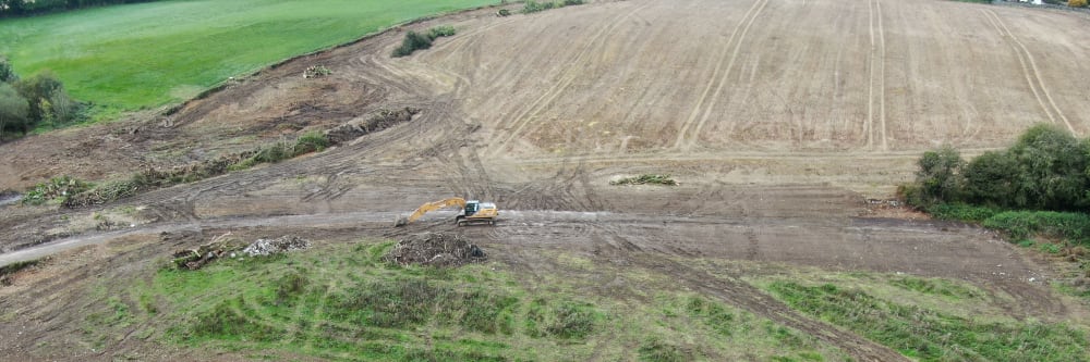 Cut and fill works being carried out in an image taken by a drone