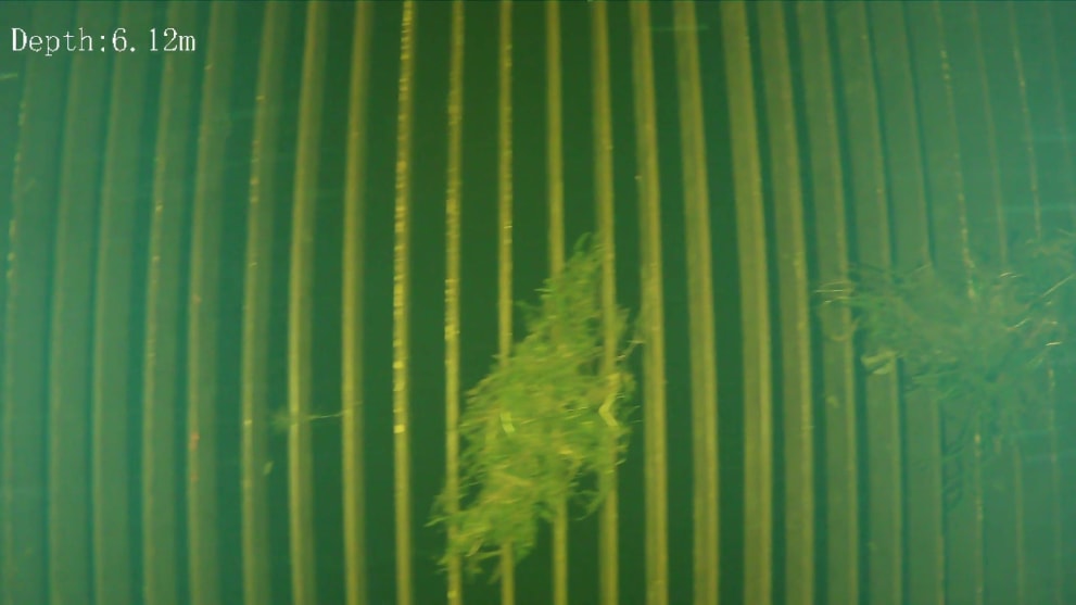 Underwater ROV footage showing the interior of hydroelectric dam infrastructure