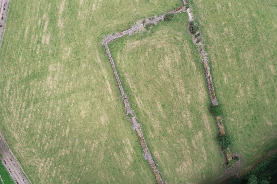 Imagery of pastureland with old stone walls