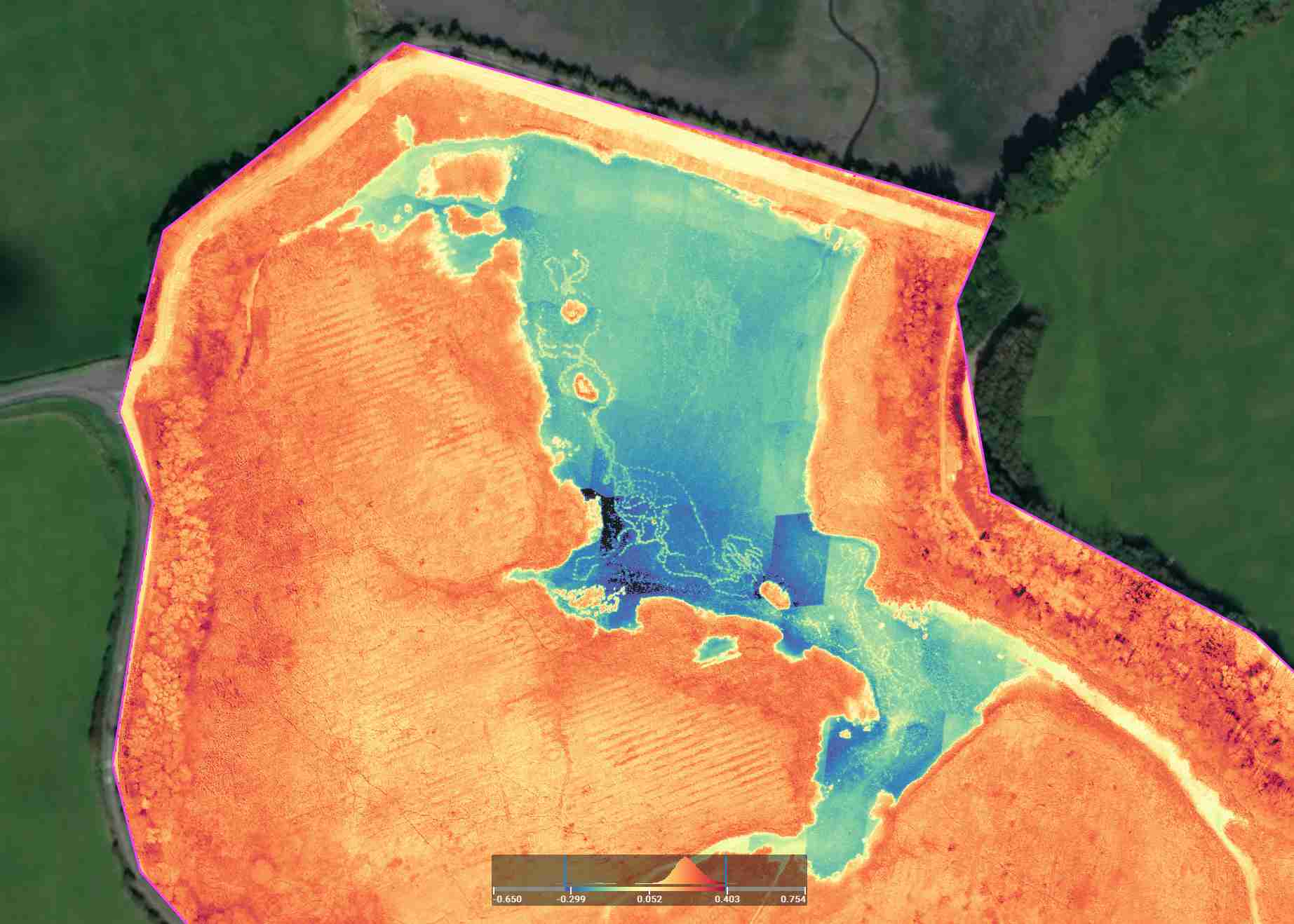A multispectral image of land and a water pond using the NDRE index