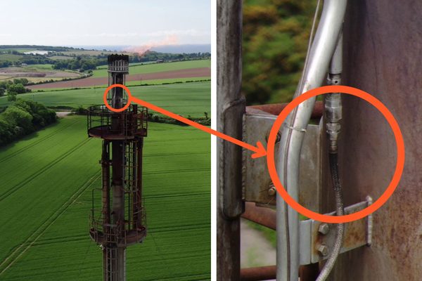 A flare stack with defects highlighted on the drone inspection imagery