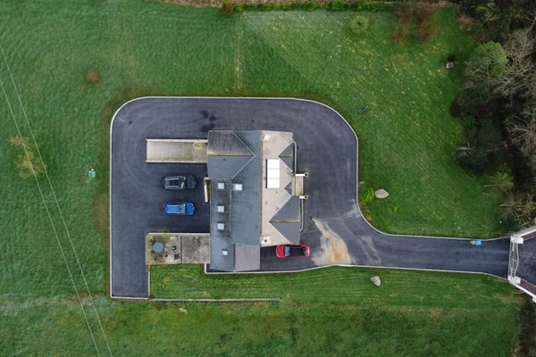 An overhead drone view of a house for insurance documentation
