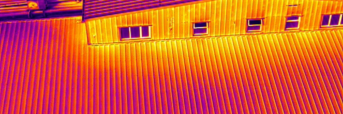 A thermal image of a roof of a building taken by a drone