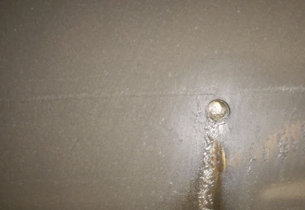 Unused probe hole checked for corrosion around penetration