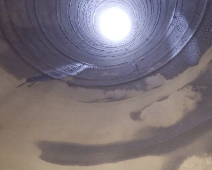 View from below looking up inside a 70-metre industrial stack