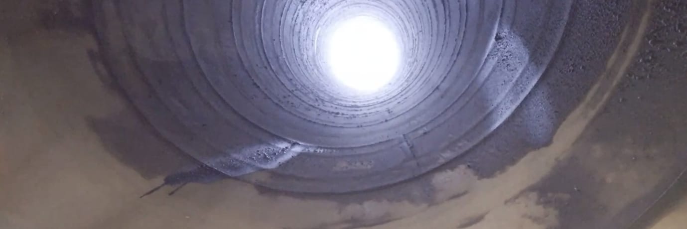 View from below looking up inside a 70-metre industrial stack