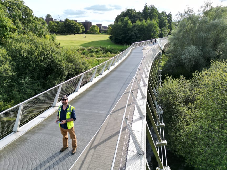 This image shows the bridge from above. This shows how difficult it would be to conduct an inspection over the side of the parapet given the unique design of this particular bridge.