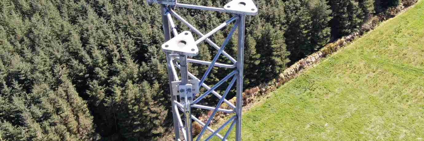 A cell tower inspected by a drone