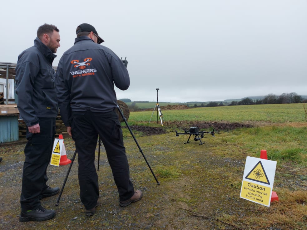 Engineers planning photogrammetric mapping mission for solar farm site