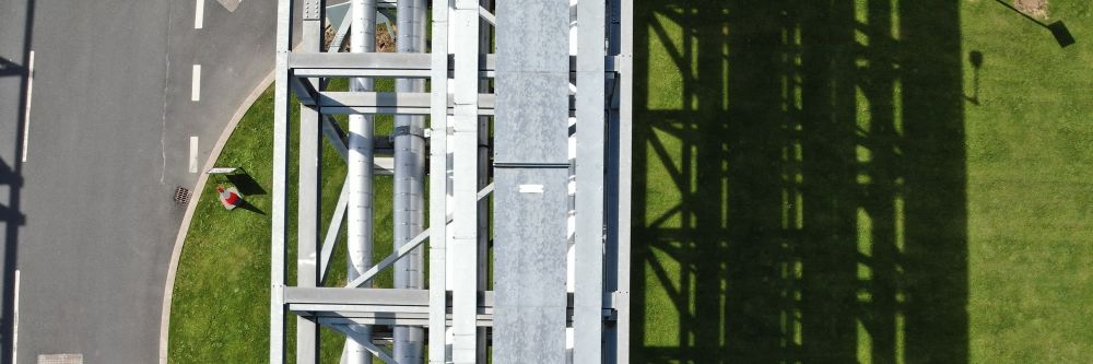 A drone inspection of an industrial pipe rack