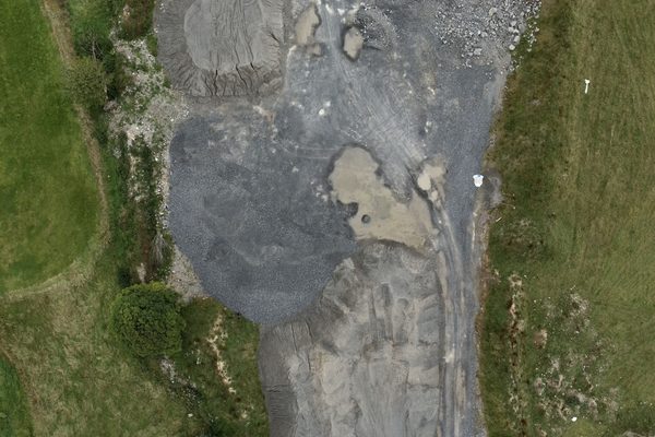 A section of quarry being assessed by a drone
