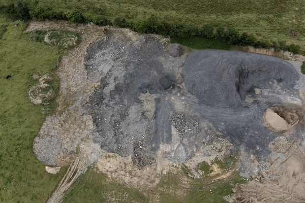 A quarry processing area being inspected bya drone
