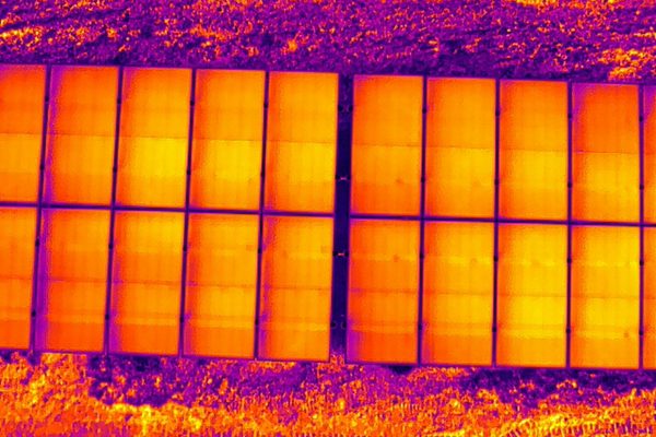 A thermal image of solar panels on a solar farm