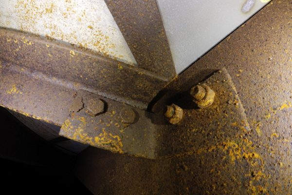 Structural steel bolted connection being inspected