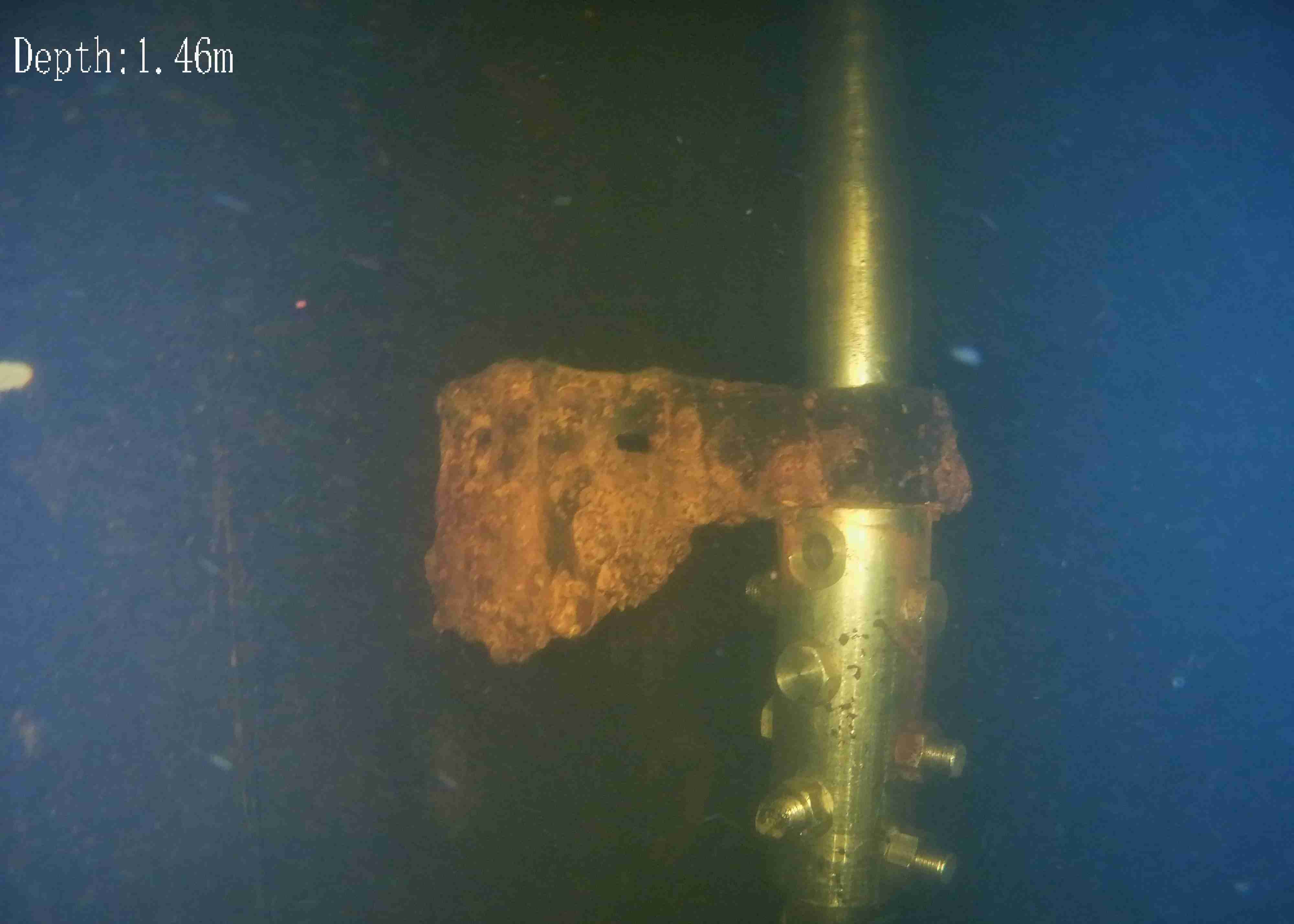 An image of a missing fastener on a pen stock gate actuation rod