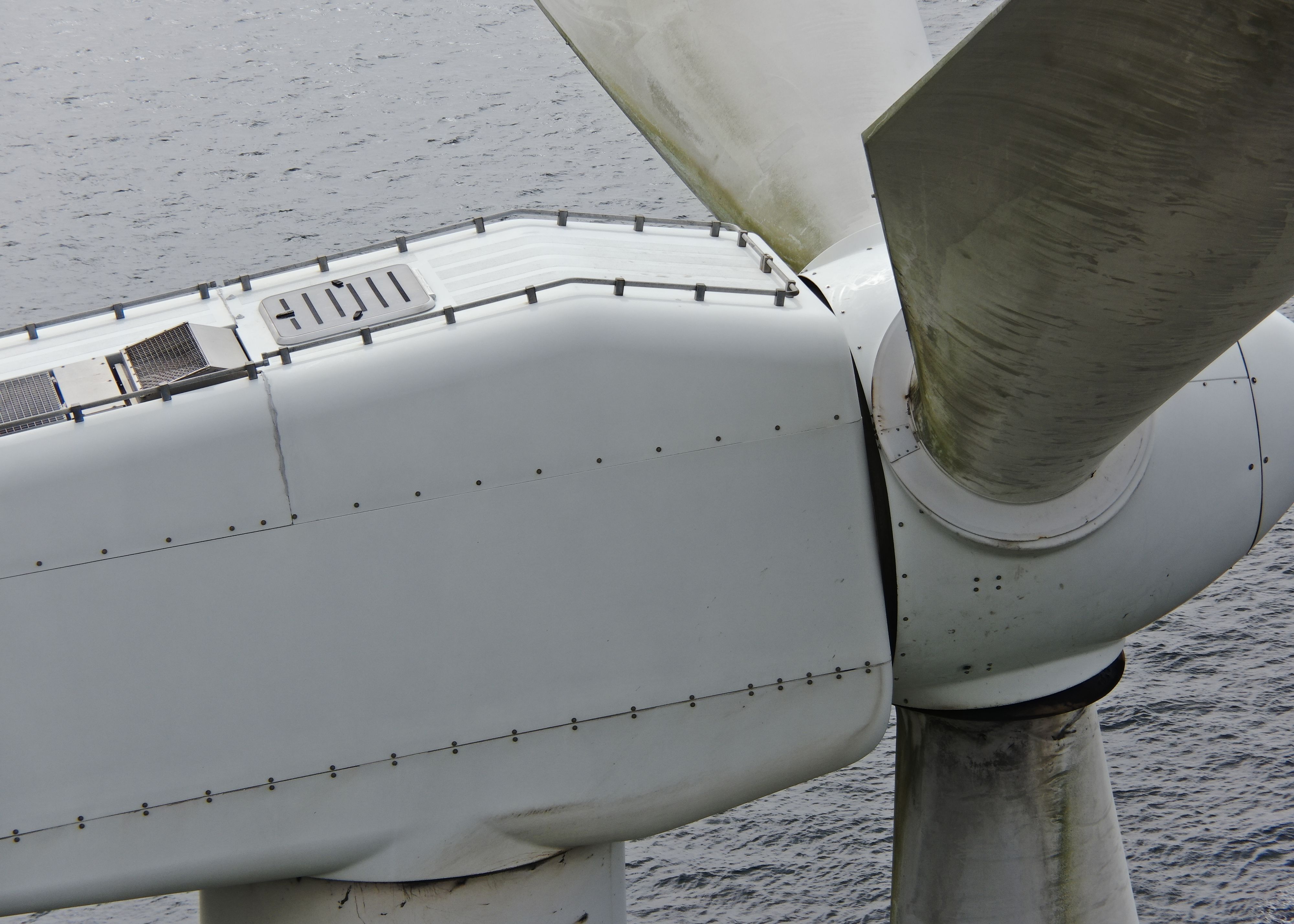 A wind turbine nacelle over the sea
