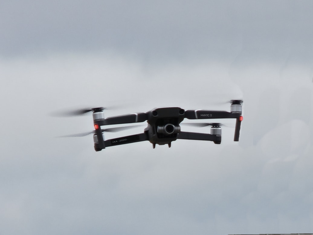 A DJI Mavic 2 Zoom inspection drone flying in the sky