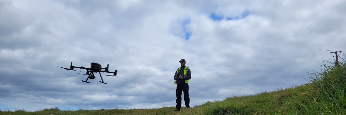 A drone operator with an inspection UAV