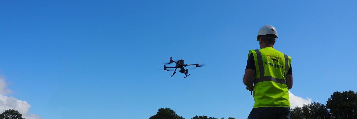 A drone pilot flying drone inspection equipment