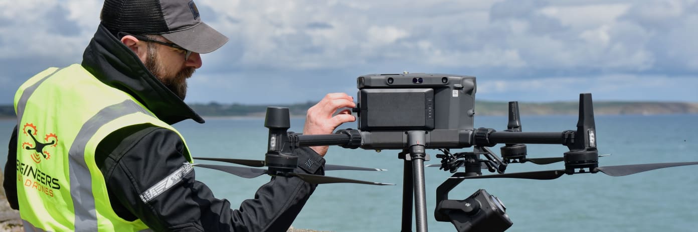 Two drone pilots with an inspection UAV